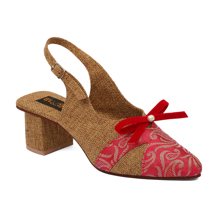 A pair of beige open-toe platform wedges with a red ankle strap and a knot detail across the front of the foot.