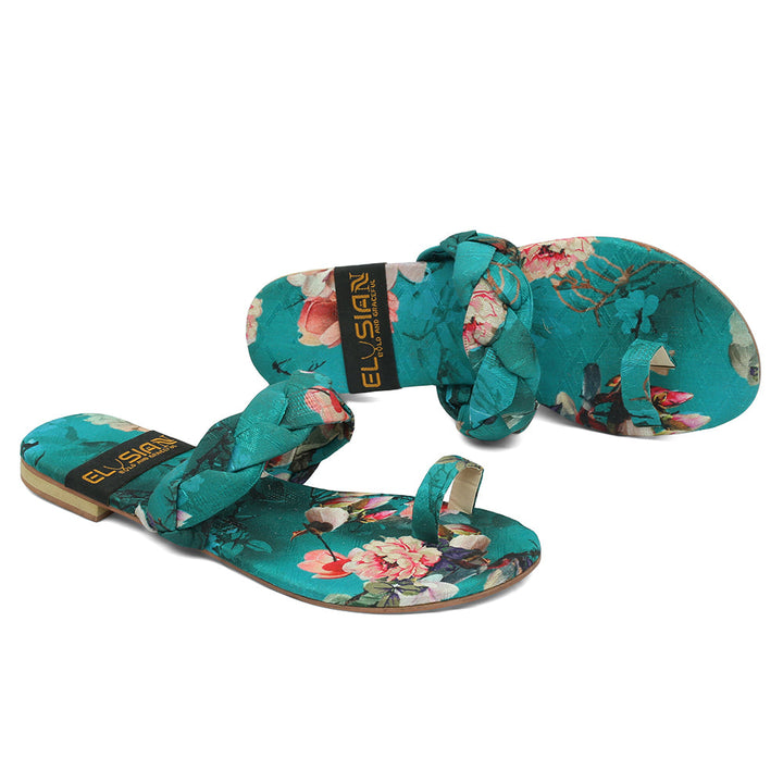 A pair of sea green floral printed slippers with the brand name 'ELYSIAN' visible on the strap.