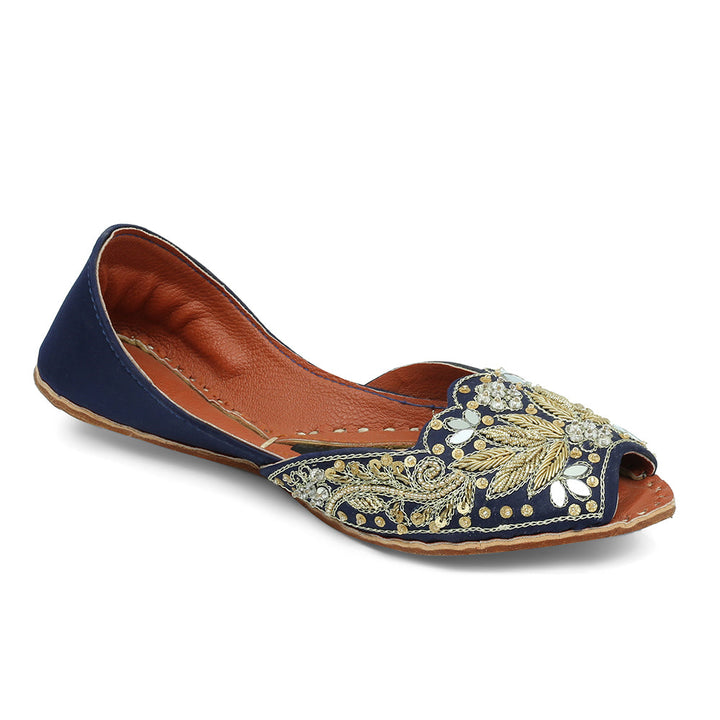 A blue and brown shoe with intricate gold embroidery on the sole, featuring a snug fit and a padded sole.